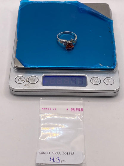 Anillo de Plata Ley 925 con Ópalo de Fuego, Zirconias y Piedra Central Naranja, peso en gramos (báscula)