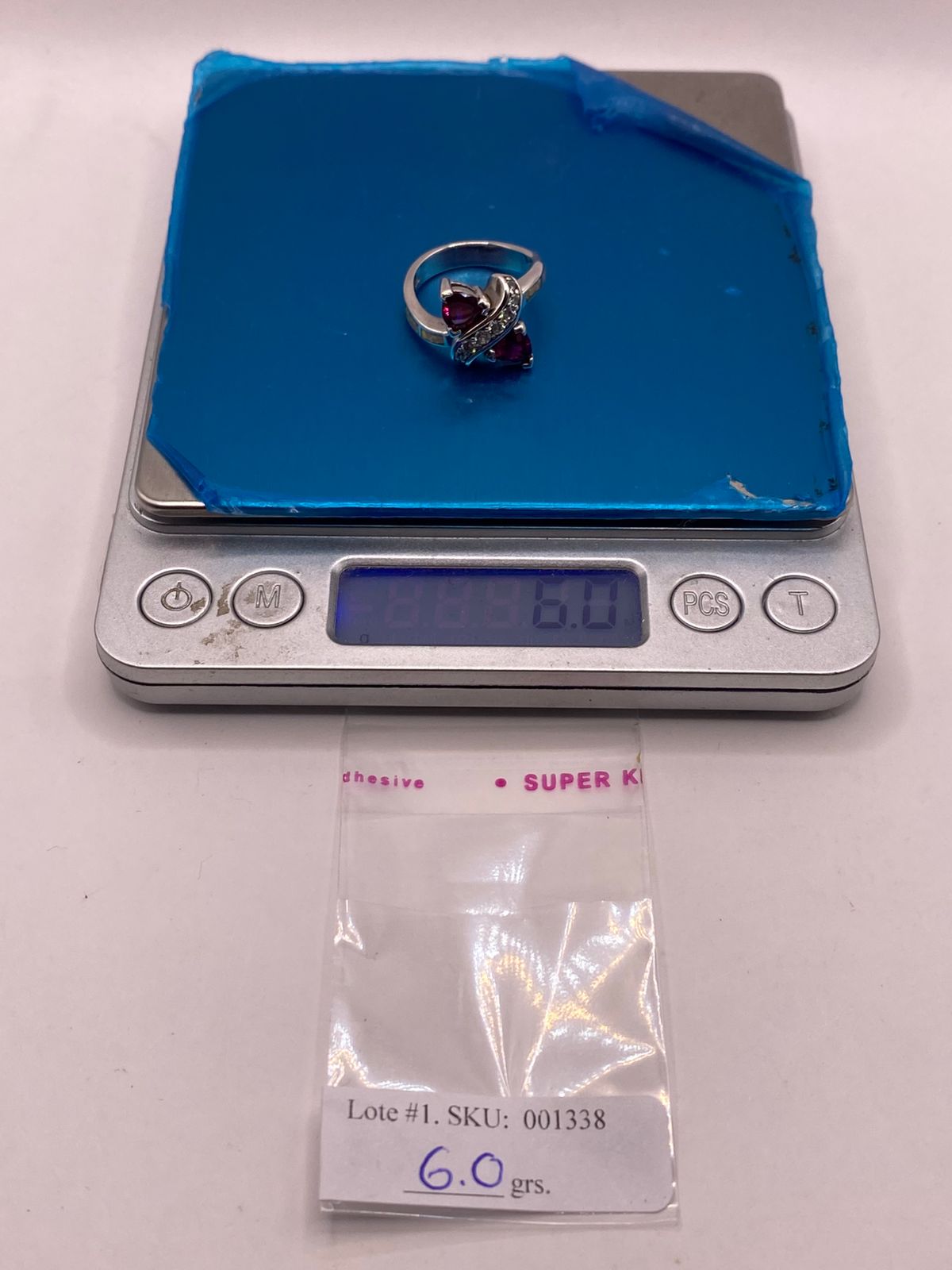 Anillo de Plata Ley 925 con Ópalo de Fuego, Zirconias y Piedras Fucsia, peso en gramos (báscula)