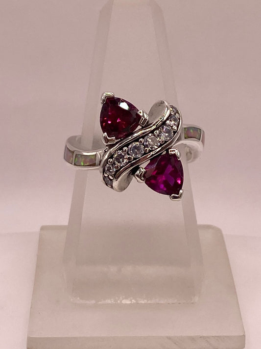 Anillo de Plata Ley 925 con Ópalo de Fuego, Zirconias y Piedras Fucsia en báscula mostrando peso