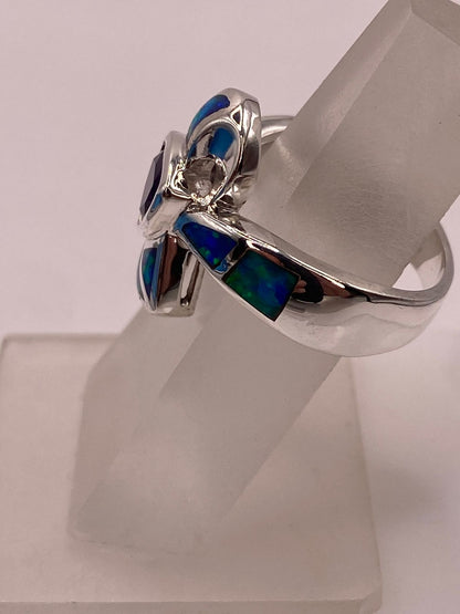 Anillo de Plata Ley 925 con Ópalo y Zirconia Morada Diseño Tipo Cruz Moderna, vista de detalle