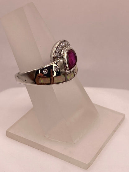Anillo de Plata Ley 925 con Ópalo de Fuego, Zirconia Fucsia y Detalles de Zirconia, vista de detalle