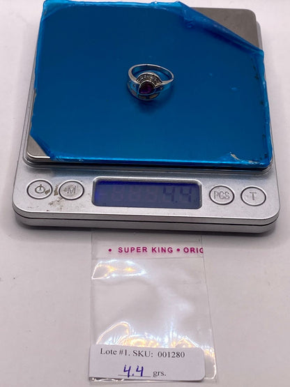 Anillo de Plata Ley 925 con Ópalo de Fuego, Zirconia Fucsia y Detalles de Zirconia, peso en gramos (báscula)