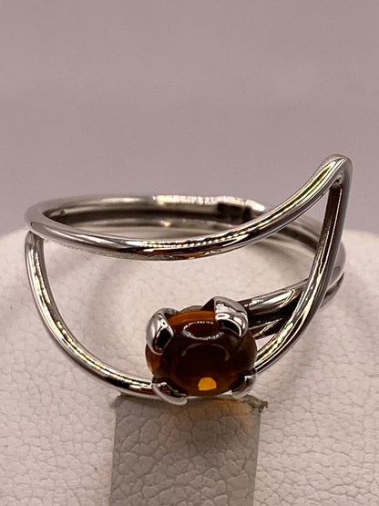 Anillo de Plata Ley 925 con Piedra Ámbar, sello de autenticidad Plata Ley .925