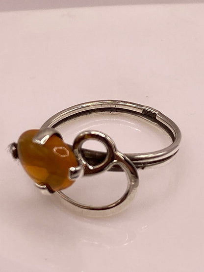Anillo de Plata Ley 925 con Piedra Ámbar, sello de autenticidad Plata Ley .925