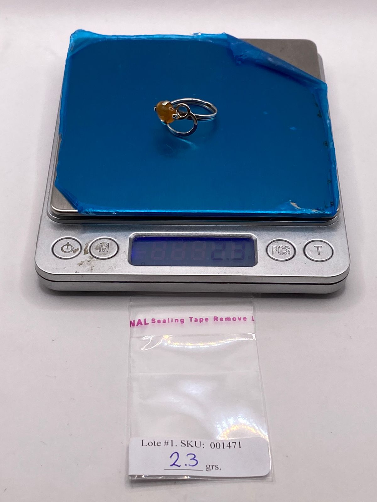 Anillo de Plata Ley 925 con Piedra Ámbar, peso en gramos (báscula)