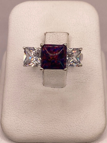 Anillo de Plata Ley 925 con Piedra Ópalo Azul y Zirconias Blancas en báscula mostrando peso
