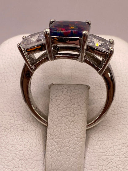 Anillo de Plata Ley 925 con Piedra Ópalo Azul y Zirconias Blancas, vista superior