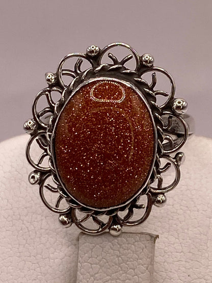Anillo de Plata Ley 925 con Piedra Sol Dorada, sello de autenticidad Plata Ley .925