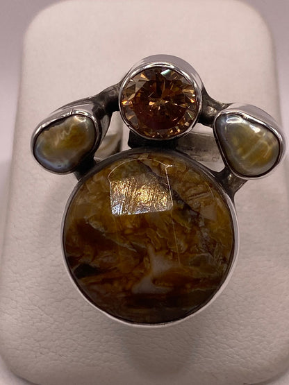 Anillo de Plata Ley 925 con Piedras Naturales Multicolor en báscula mostrando peso