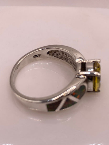 Anillo de Plata Ley 925 con Zirconia Amarilla y Ópalo de Fueg, sello de autenticidad Plata Ley .925