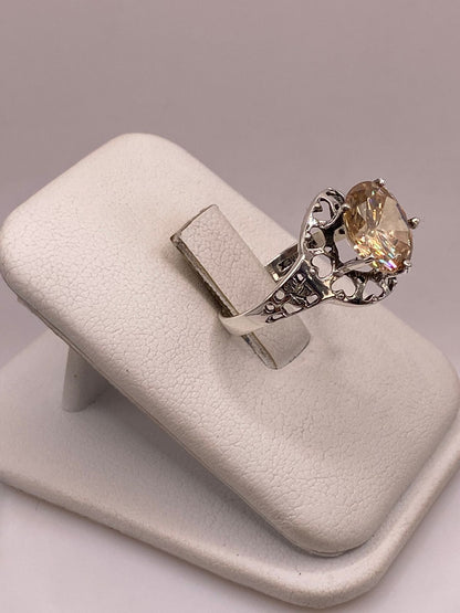 Anillo de Plata Ley 925 con Zirconia Color Champagne, vista lateral