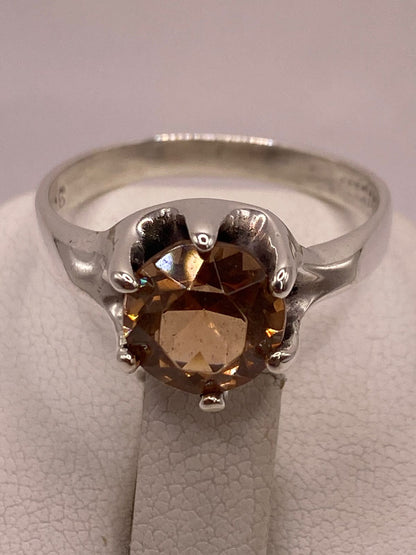 Anillo de Plata Ley 925 con Zirconia Color Champagne, sello de autenticidad Plata Ley .925