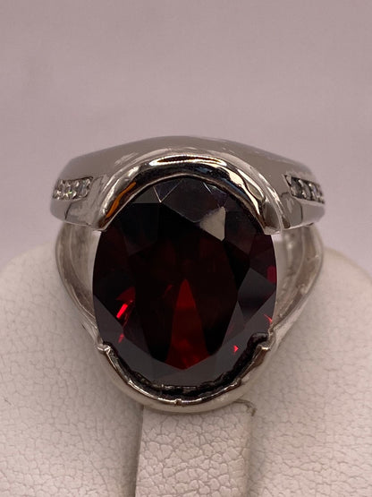 Anillo de Plata Ley 925 con Zirconia Color Granate Ovalada, sello de autenticidad Plata Ley .925