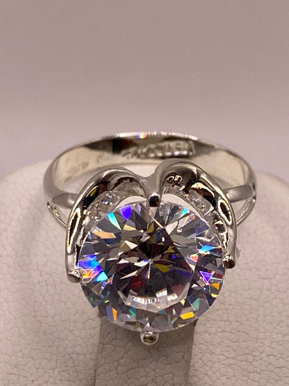 Anillo de Plata Ley 925 con Zirconia Cristal Corte Redondo Diseño Clásico Elegante, sello de autenticidad Plata Ley .925