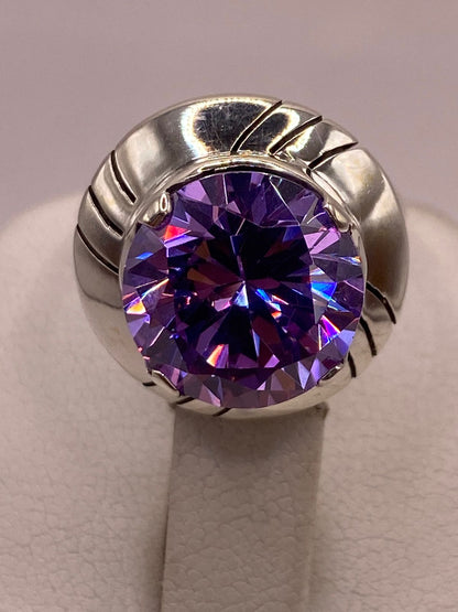 Anillo de Plata Ley 925 con Zirconia Morada, sello de autenticidad Plata Ley .925