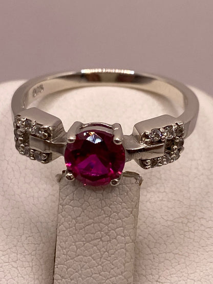 Anillo de Plata Ley 925 con Zirconia Rosa Diseño Elegante, sello de autenticidad Plata Ley .925