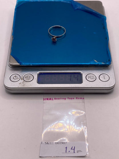 Anillo de Plata Ley 925 con Zirconia Rosa Redonda, peso en gramos (báscula)