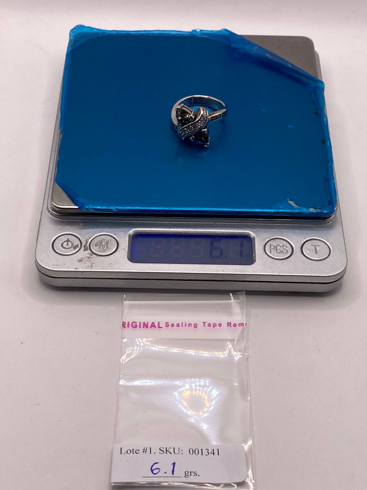 Anillo de Plata Ley 925 con Zirconias Trillon Oscuras, Ópalo de Fuego y Zirconias, peso en gramos (báscula)