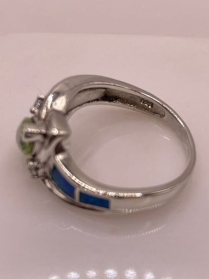 Anillo de Plata Ley 925 con Zirconia Verde, Ópalo de Fuego y Diseño Elegante, sello de autenticidad Plata Ley .925