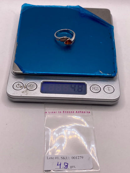 Anillo de Plata Ley 925 con Zirconia Naranja y Ópalo de Fuego, peso en gramos (báscula)