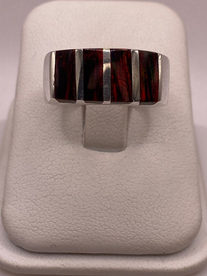 Anillo de Plata Ley 950 con Ópalo de Fuego Rojo en báscula mostrando peso