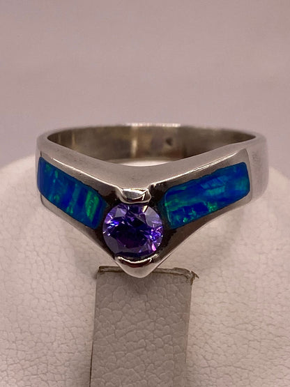 Anillo de Plata Ley 9250 con Ópalo de Fuego y Zirconia Morada, sello de autenticidad Plata Ley .925
