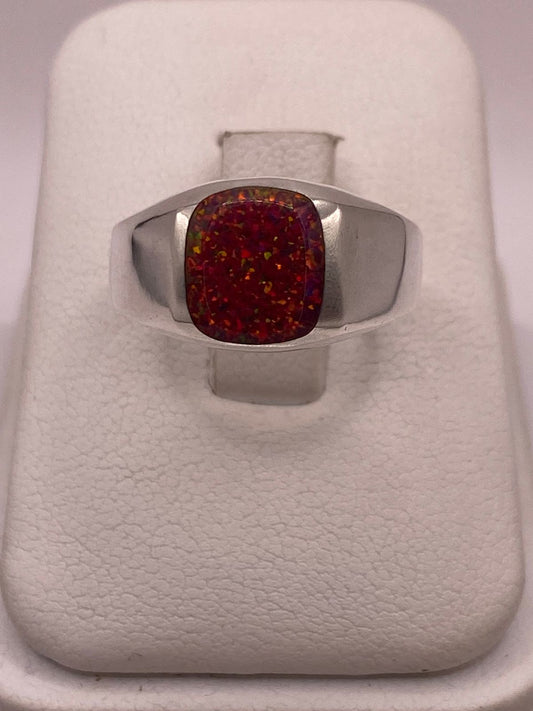 Anillo de Plata Ley 950 con Ópalo Rojo Iridiscente — vista lateral