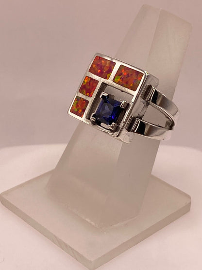 Anillo de Plata .950 con Ópalo de Fuego y Zirconia Azul Diseño Geométrico Moderno, vista frontal