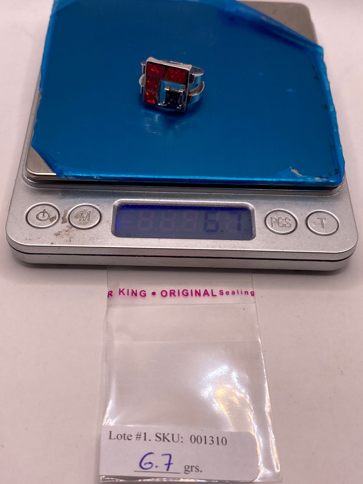 Anillo de Plata .950 con Ópalo de Fuego y Zirconia Azul Diseño Geométrico Moderno, peso en gramos (báscula)
