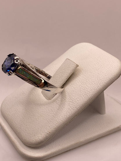 Anillo de Plata .950 con Zirconia Azul y Ópalo de Fuego Diseño Solitario, vista lateral