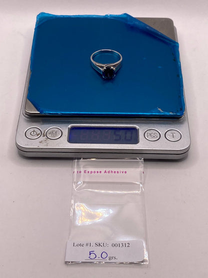 Anillo de Plata .950 con Zirconia Azul y Ópalo de Fuego Diseño Solitario, peso en gramos (báscula)