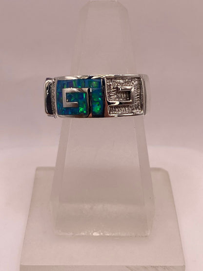 Anillo de Plata .950 con Zirconia Morada y Ópalo de Fuego Diseño Greca, sello de autenticidad Plata Ley .925