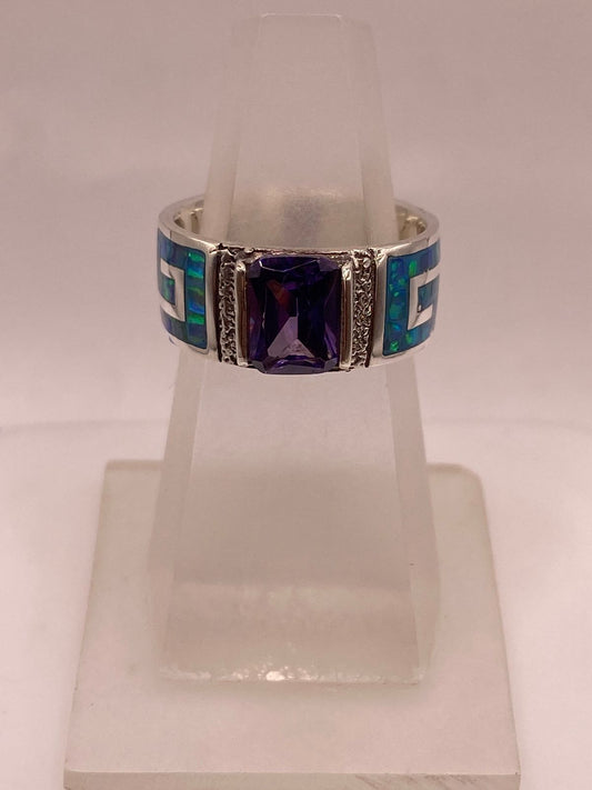 Anillo de Plata .950 con Zirconia Morada y Ópalo de Fuego Diseño Greca — vista lateral