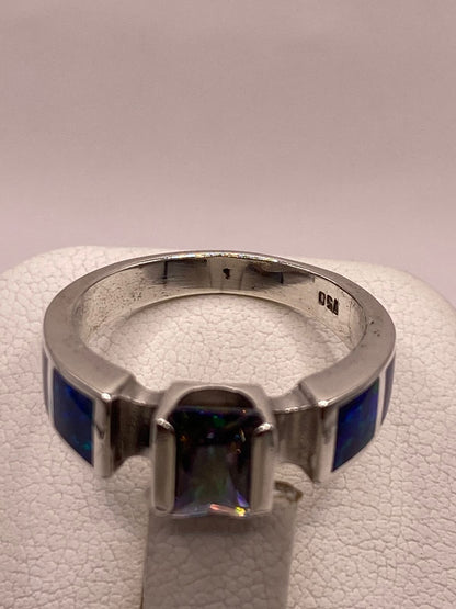 Anillo de Plata .950 con Zirconia y Ópalo de Fuego Diseño Geométrico Elegante, sello de autenticidad Plata Ley .925