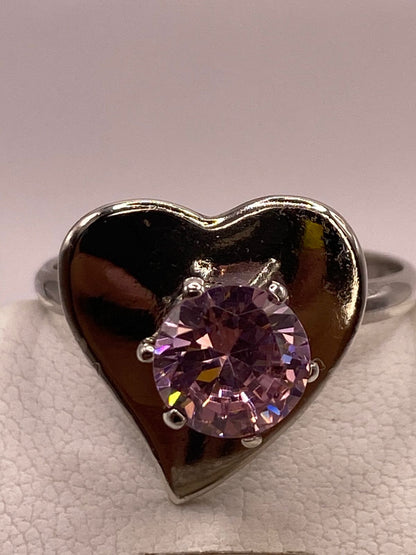 Anillo de Plata 925 con Corazón y Zirconia Rosa Facetada, sello de autenticidad Plata Ley .925