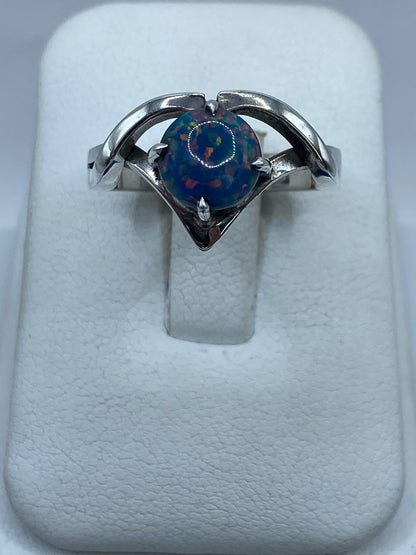Anillo de Plata .925 con Ópalo de Fuego Azul Pastel y Destellos Tornasol, vista de detalle