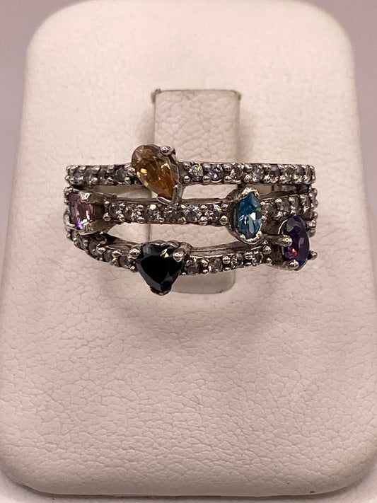 Anillo de Plata 925 con Zirconias Multicolor, Diseño Triple Banda — ángulo diagonal