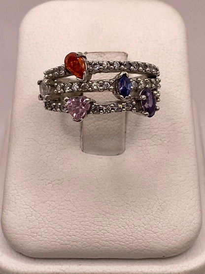 Anillo de Plata 925 con Zirconias Multicolor Diseño Triple Banda Elegante — ángulo diagonal