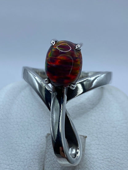 Anillo de Plata .925 con Ópalo de Fuego Naranja-rojo y Destellos Verdes, sello de autenticidad Plata Ley .925