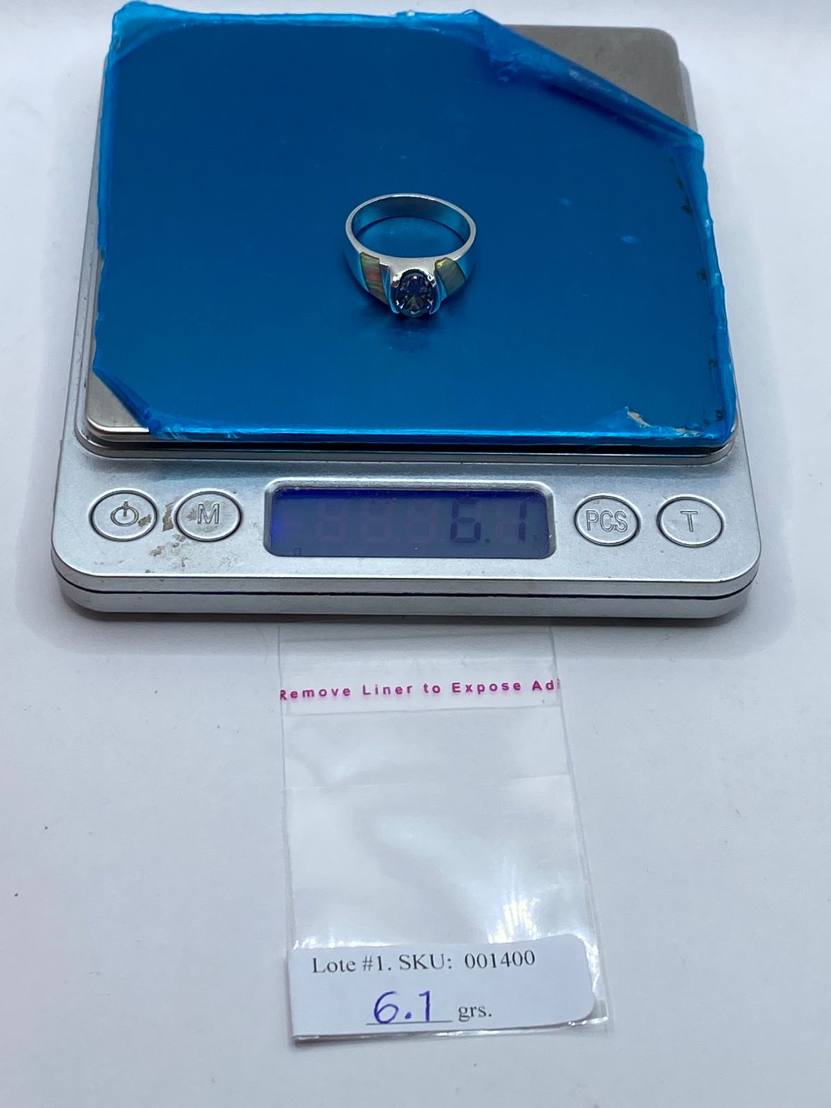 Anillo de Plata .950 con Ópalo de Fuego y Zirconia Blanca, peso en gramos (báscula)