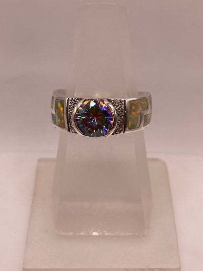 Anillo de Plata .950 con Ópalo de Fuego y Zirconia Multicolor Diseño Greca, vista lateral