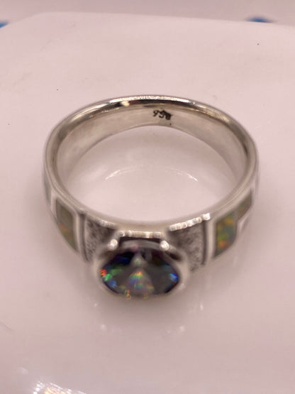 Anillo de Plata .950 con Ópalo de Fuego y Zirconia Multicolor Diseño Greca, sello de autenticidad Plata Ley .925