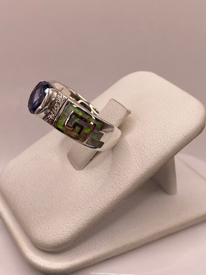 Anillo de Plata .950 con Ópalo de Fuego y Zirconia Azul – Diseño Greca, vista frontal