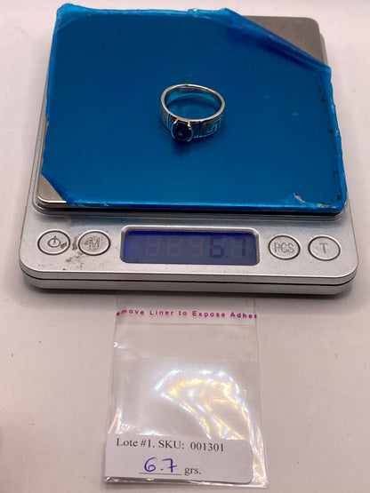 Anillo de Plata .950 con Ópalo de Fuego y Zirconia Azul – Diseño Greca, peso en gramos (báscula)