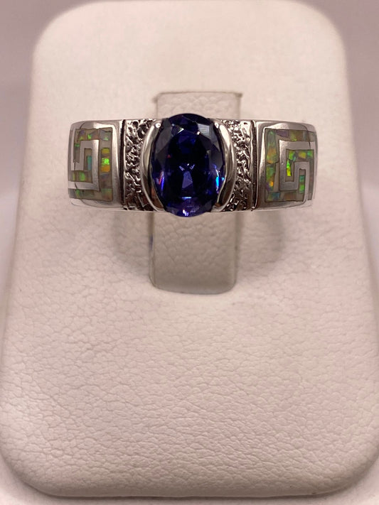 Anillo de Plata .950 con Ópalo de Fuego y Zirconia Azul Diseño Greca — ángulo diagonal