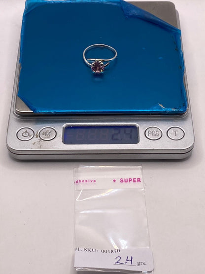 Anillo Solitario Cruzado de Plata Ley 925 con Zirconia Rosa, peso en gramos (báscula)