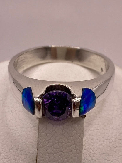 Anillo Solitario de Plata Ley 925 con Ópalo de Fuego y Zirconia Lila, sello de autenticidad Plata Ley .925