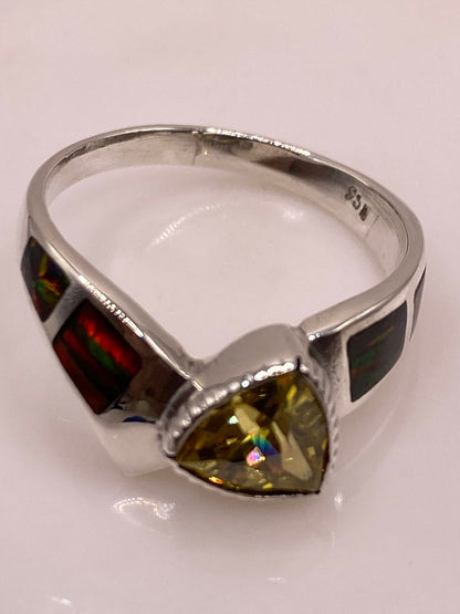 Anillo Solitario de Plata Ley 950 con Ópalo de Fuego Multicolor y Zirconia Amarilla, sello de autenticidad Plata Ley .925