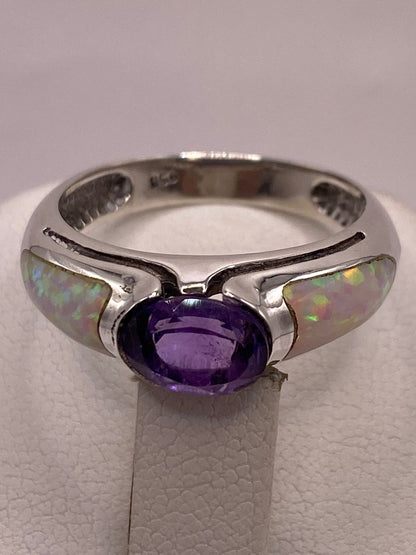 Anillo Solitario de Plata Ley 950 con Ópalo de Fuego y Zirconia, sello de autenticidad Plata Ley .925