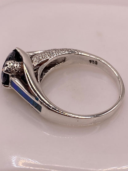 Anillo Solitario de Plata Ley 950 con Ópalo de Fuego y Zirconia Azul, sello de autenticidad Plata Ley .925